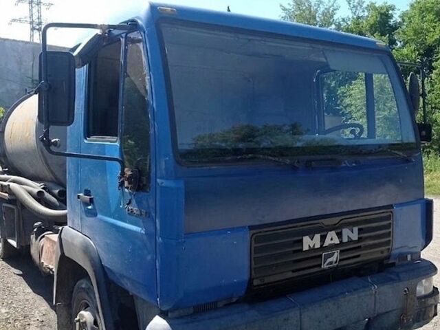 Синий МАН Л 2000, объемом двигателя 4.58 л и пробегом 300 тыс. км за 12000 $, фото 1 на Automoto.ua