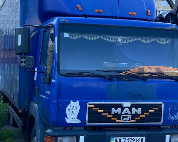 Синій МАН L 2000, об'ємом двигуна 6.9 л та пробігом 571 тис. км за 7300 $, фото 1 на Automoto.ua