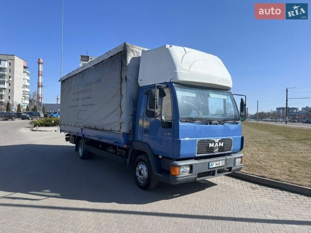 Синий МАН Л 2000, объемом двигателя 4.58 л и пробегом 810 тыс. км за 11999 $, фото 1 на Automoto.ua