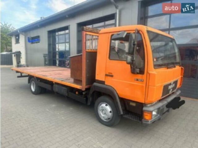 Помаранчевий МАН L 2000, об'ємом двигуна 4.7 л та пробігом 320 тис. км за 7300 $, фото 1 на Automoto.ua