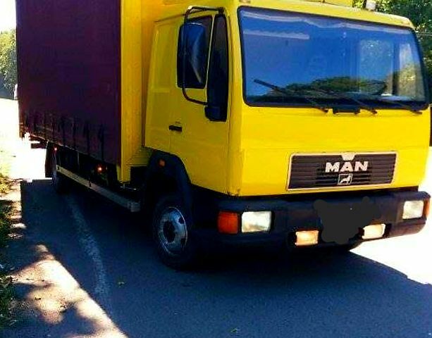 Желтый МАН Л, объемом двигателя 4.6 л и пробегом 699 тыс. км за 13000 $, фото 1 на Automoto.ua