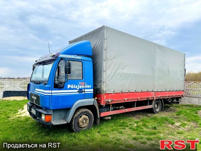 Синий МАН Л, объемом двигателя 6.9 л и пробегом 400 тыс. км за 13500 $, фото 1 на Automoto.ua