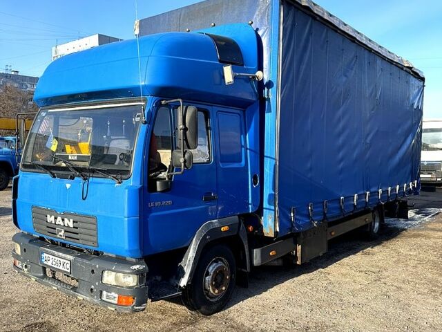 Синий МАН Л, объемом двигателя 6.9 л и пробегом 581 тыс. км за 14000 $, фото 1 на Automoto.ua