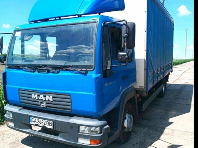 Синий МАН Л, объемом двигателя 6.9 л и пробегом 400 тыс. км за 16000 $, фото 1 на Automoto.ua