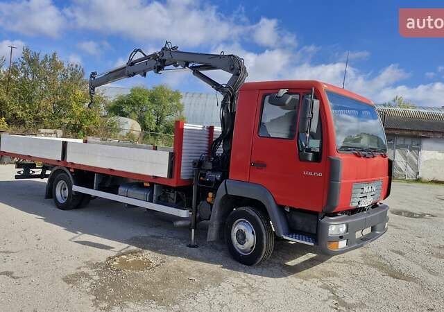 Красный МАН ЛЕ 150, объемом двигателя 4.3 л и пробегом 451 тыс. км за 22950 $, фото 1 на Automoto.ua