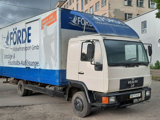 Белый МАН ТГА, объемом двигателя 46 л и пробегом 600 тыс. км за 10700 $, фото 1 на Automoto.ua