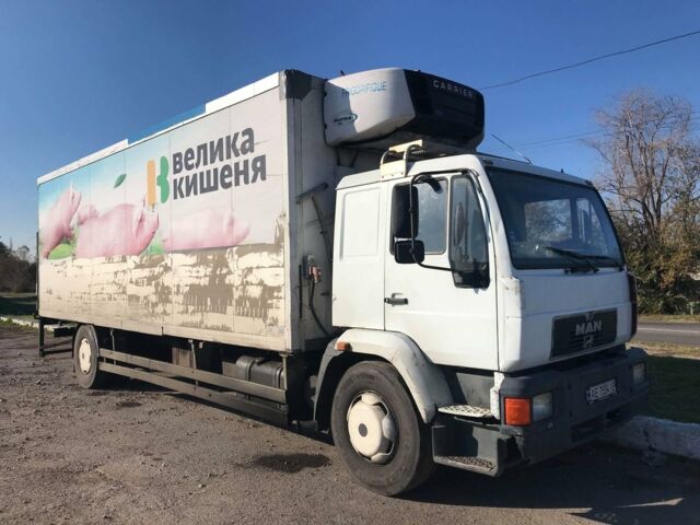 Белый МАН ТГА, объемом двигателя 2.4 л и пробегом 560 тыс. км за 10000 $, фото 1 на Automoto.ua