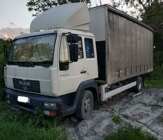 Белый МАН ТГА, объемом двигателя 6.9 л и пробегом 260 тыс. км за 14000 $, фото 1 на Automoto.ua