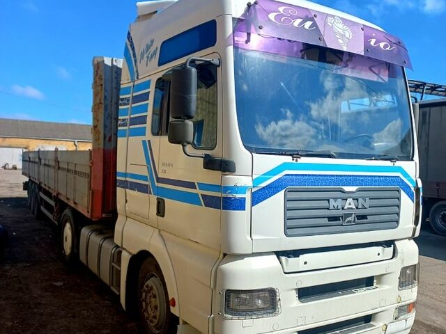 Белый МАН ТГА, объемом двигателя 12 л и пробегом 320 тыс. км за 7000 $, фото 1 на Automoto.ua