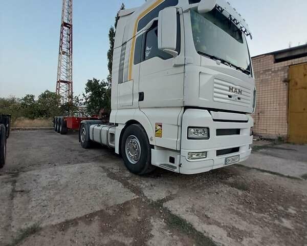 Белый МАН ТГА, объемом двигателя 10.52 л и пробегом 480 тыс. км за 18000 $, фото 1 на Automoto.ua