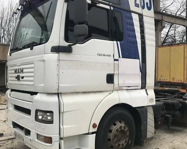 Білий МАН TGA, об'ємом двигуна 10.5 л та пробігом 911 тис. км за 6300 $, фото 1 на Automoto.ua