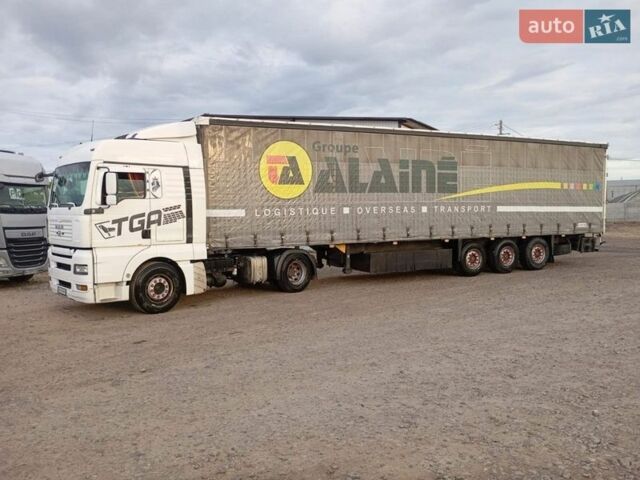 Белый МАН ТГА, объемом двигателя 10.5 л и пробегом 378 тыс. км за 11900 $, фото 1 на Automoto.ua