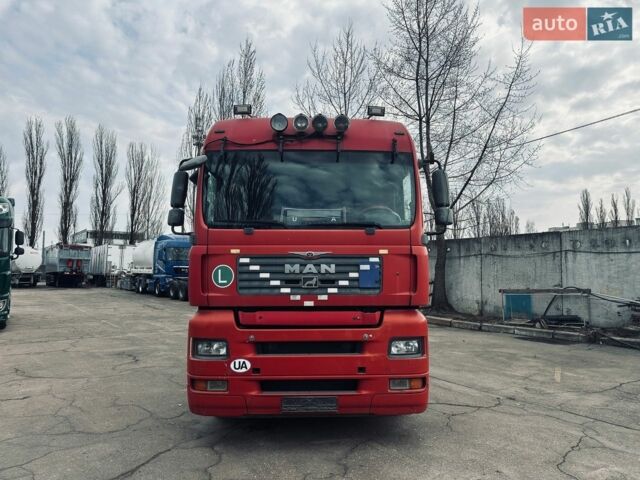 Красный МАН ТГА, объемом двигателя 10.52 л и пробегом 745 тыс. км за 11700 $, фото 1 на Automoto.ua