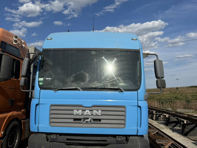 Синий МАН ТГА, объемом двигателя 10.52 л и пробегом 700 тыс. км за 18500 $, фото 1 на Automoto.ua