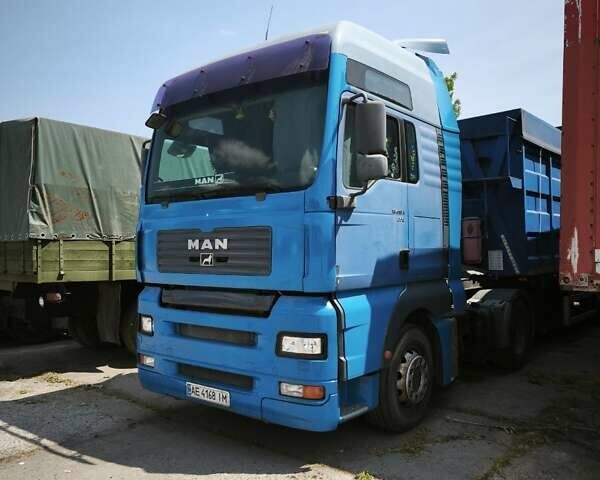 Синий МАН ТГА, объемом двигателя 11.97 л и пробегом 1000 тыс. км за 28000 $, фото 1 на Automoto.ua