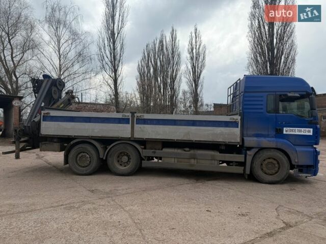 Синий МАН ТГА, объемом двигателя 10.52 л и пробегом 238 тыс. км за 33000 $, фото 1 на Automoto.ua