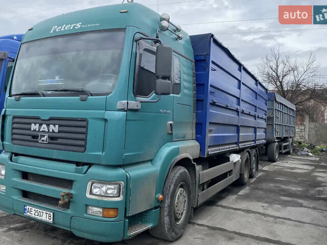 Зеленый МАН ТГА, объемом двигателя 12.82 л и пробегом 300 тыс. км за 21000 $, фото 1 на Automoto.ua