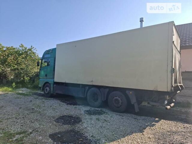 Зеленый МАН ТГА, объемом двигателя 12.82 л и пробегом 370 тыс. км за 17000 $, фото 1 на Automoto.ua