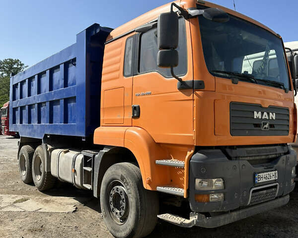 Оранжевый МАН ТГА, объемом двигателя 11 л и пробегом 700 тыс. км за 33700 $, фото 1 на Automoto.ua