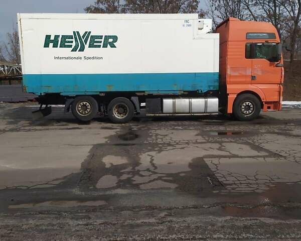 Помаранчевий МАН TGA, об'ємом двигуна 12.82 л та пробігом 900 тис. км за 15000 $, фото 1 на Automoto.ua
