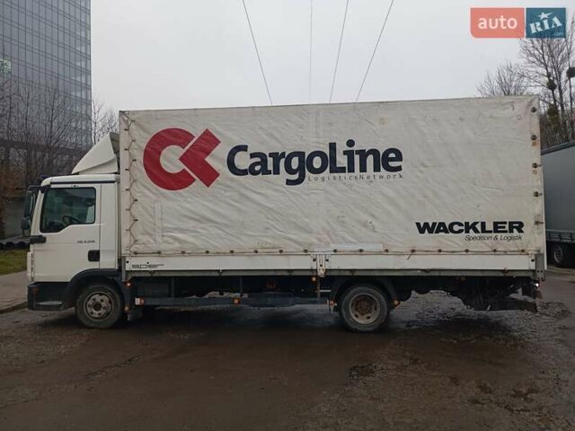 Белый МАН ТГЛ, объемом двигателя 4.58 л и пробегом 579 тыс. км за 15500 $, фото 1 на Automoto.ua