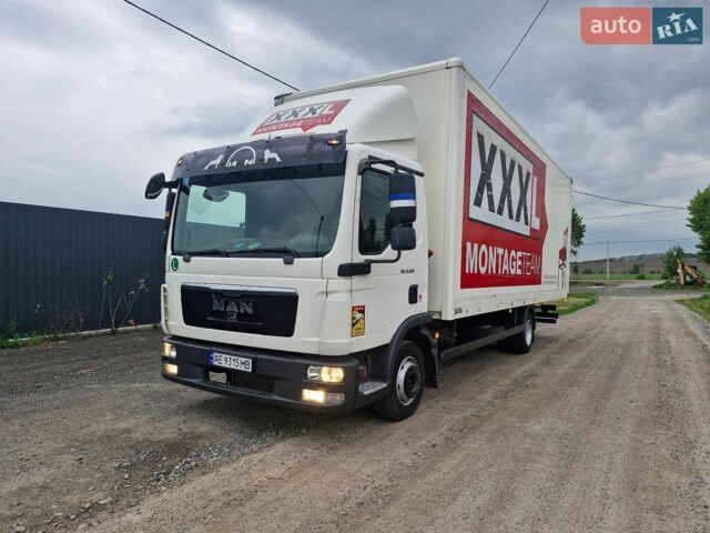 Белый МАН ТГЛ, объемом двигателя 4.58 л и пробегом 770 тыс. км за 18000 $, фото 1 на Automoto.ua