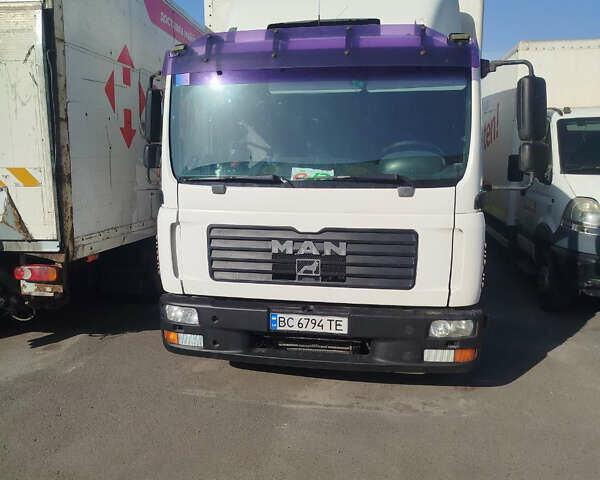 Белый МАН ТГЛ, объемом двигателя 4.58 л и пробегом 470 тыс. км за 14000 $, фото 1 на Automoto.ua