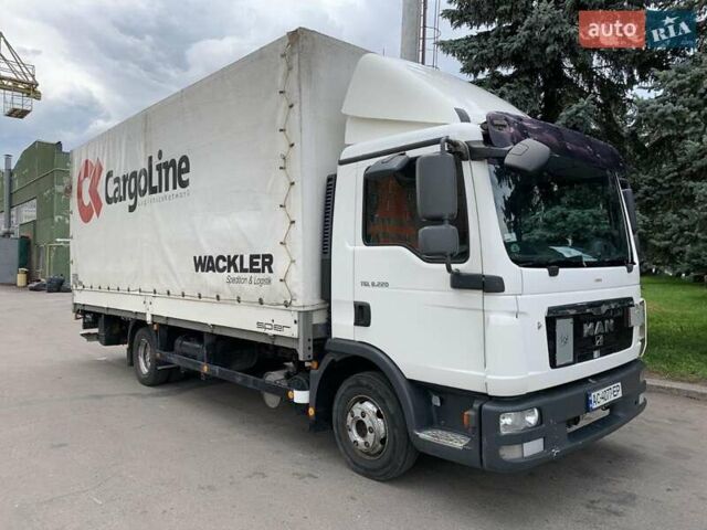 Белый МАН ТГЛ, объемом двигателя 4.58 л и пробегом 579 тыс. км за 18000 $, фото 1 на Automoto.ua