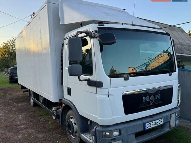 Белый МАН ТГЛ, объемом двигателя 4.58 л и пробегом 420 тыс. км за 18900 $, фото 1 на Automoto.ua