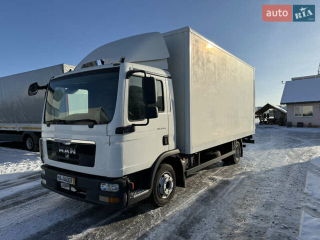 Белый МАН ТГЛ, объемом двигателя 4.6 л и пробегом 430 тыс. км за 24900 $, фото 1 на Automoto.ua