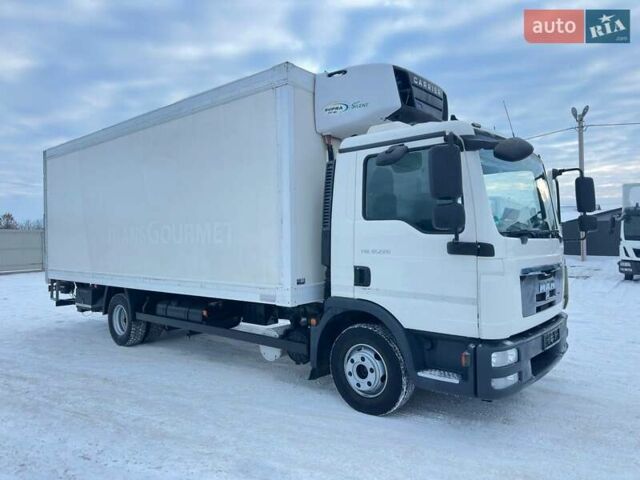 Белый МАН ТГЛ, объемом двигателя 4.6 л и пробегом 438 тыс. км за 33900 $, фото 1 на Automoto.ua