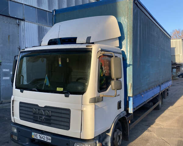 Білий МАН TGL, об'ємом двигуна 4.6 л та пробігом 890 тис. км за 14000 $, фото 1 на Automoto.ua