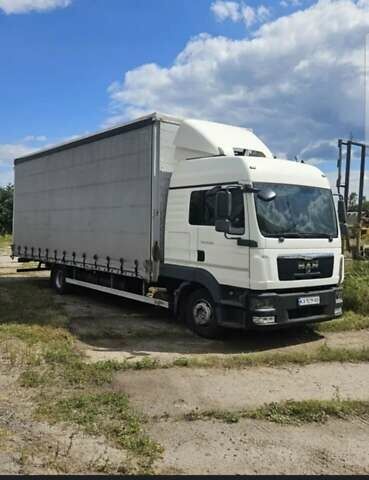 Білий МАН TGL, об'ємом двигуна 4.58 л та пробігом 980 тис. км за 26000 $, фото 1 на Automoto.ua