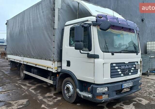 Белый МАН ТГЛ, объемом двигателя 4.58 л и пробегом 590 тыс. км за 14750 $, фото 1 на Automoto.ua