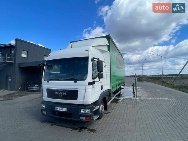 Белый МАН ТГЛ, объемом двигателя 4.6 л и пробегом 941 тыс. км за 34500 $, фото 1 на Automoto.ua