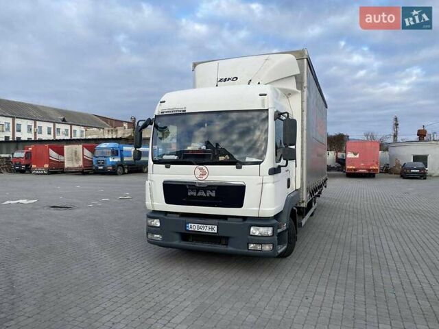 Белый МАН ТГЛ, объемом двигателя 4.6 л и пробегом 950 тыс. км за 19500 $, фото 1 на Automoto.ua