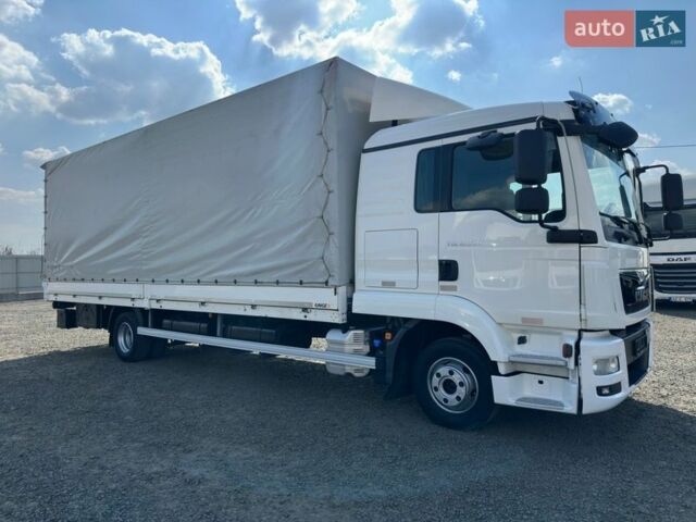 Белый МАН ТГЛ, объемом двигателя 4.6 л и пробегом 686 тыс. км за 35900 $, фото 1 на Automoto.ua