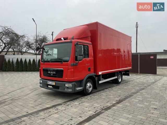 Красный МАН ТГЛ, объемом двигателя 4.6 л и пробегом 309 тыс. км за 22750 $, фото 1 на Automoto.ua