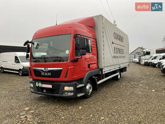 Красный МАН ТГЛ, объемом двигателя 4.6 л и пробегом 490 тыс. км за 36999 $, фото 1 на Automoto.ua