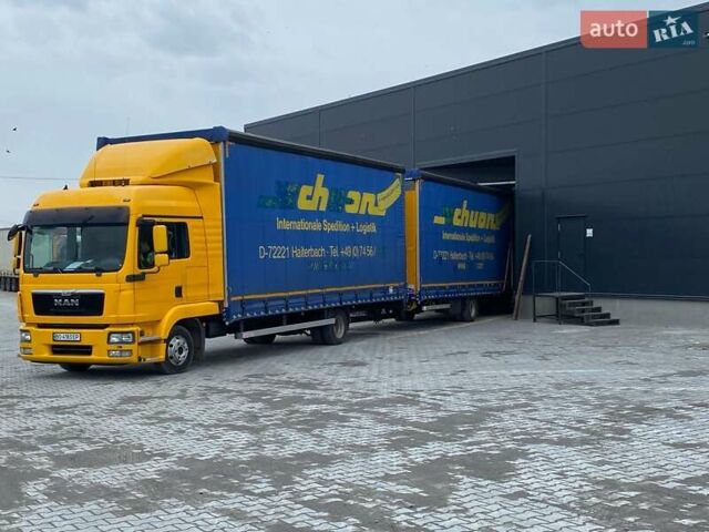 Желтый МАН ТГЛ, объемом двигателя 4.58 л и пробегом 910 тыс. км за 33000 $, фото 1 на Automoto.ua