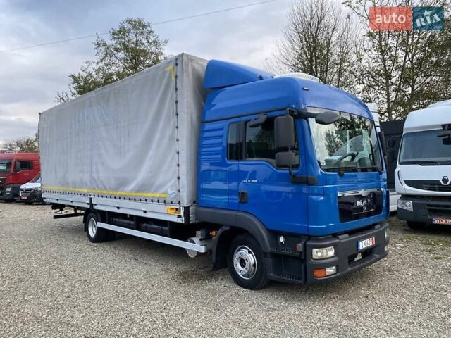 Синий МАН ТГЛ, объемом двигателя 4.6 л и пробегом 670 тыс. км за 21999 $, фото 1 на Automoto.ua
