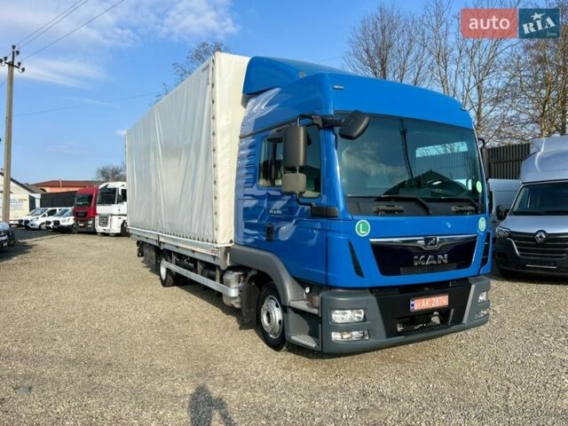 Синий МАН ТГЛ, объемом двигателя 4.6 л и пробегом 430 тыс. км за 34300 $, фото 1 на Automoto.ua