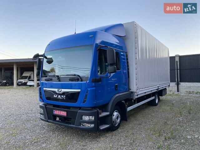 Синий МАН ТГЛ, объемом двигателя 4.6 л и пробегом 400 тыс. км за 36800 $, фото 1 на Automoto.ua