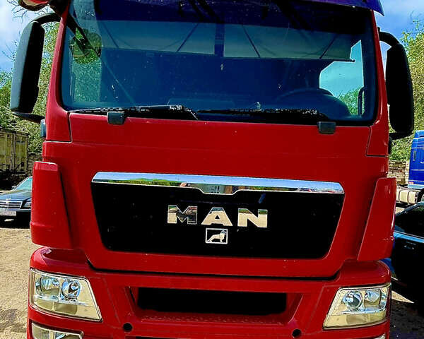 Красный МАН ТГС, объемом двигателя 10.5 л и пробегом 398 тыс. км за 12500 $, фото 1 на Automoto.ua