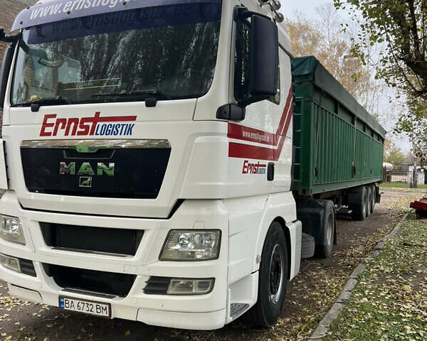 Красный МАН ТГКС, объемом двигателя 10.5 л и пробегом 890 тыс. км за 28000 $, фото 1 на Automoto.ua
