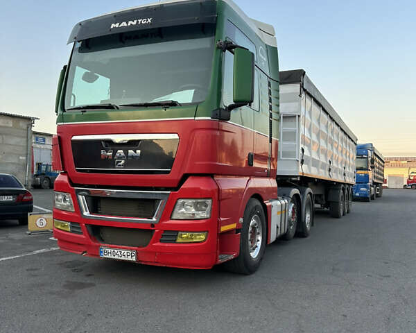 Красный МАН ТГКС, объемом двигателя 12.42 л и пробегом 700 тыс. км за 40500 $, фото 1 на Automoto.ua