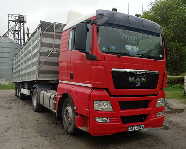 Красный МАН ТГКС, объемом двигателя 10.52 л и пробегом 740 тыс. км за 44000 $, фото 1 на Automoto.ua