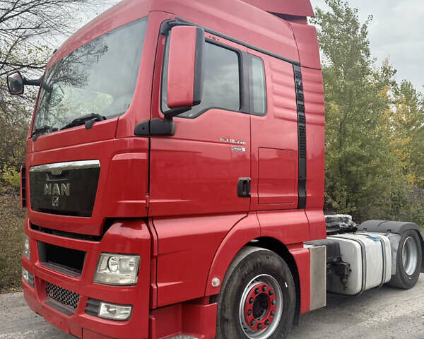Красный МАН ТГКС, объемом двигателя 10.52 л и пробегом 960 тыс. км за 16500 $, фото 1 на Automoto.ua