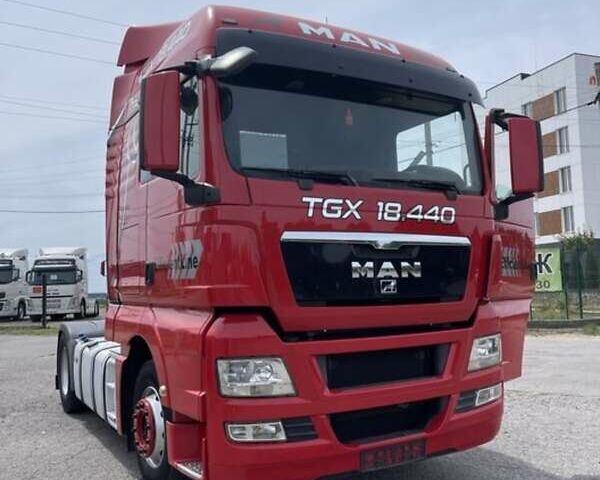 Красный МАН ТГКС, объемом двигателя 10.52 л и пробегом 900 тыс. км за 22000 $, фото 1 на Automoto.ua