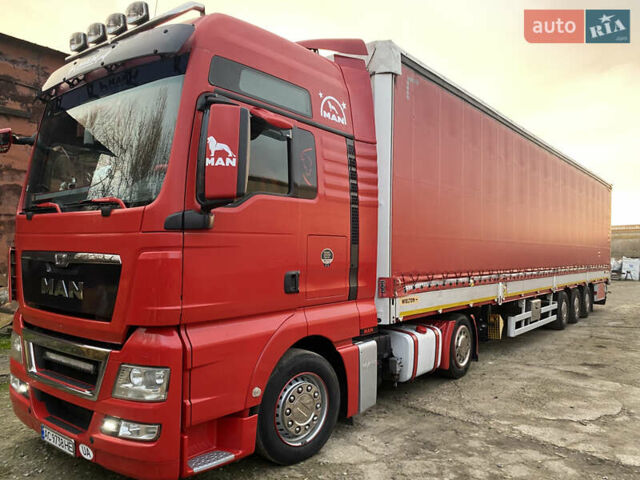 Красный МАН ТГКС, объемом двигателя 10.52 л и пробегом 107 тыс. км за 29000 $, фото 1 на Automoto.ua